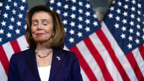 House Speaker Nancy Pelosi of Calif. appears to be emotional before signing H.R. 8404, the Respect For Marriage Act, during a signing ceremony on Capitol Hill in Washington, Thursday, Dec. 8, 2022.