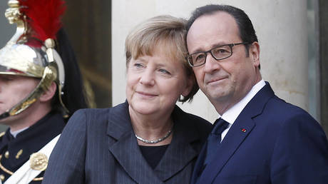 FILE PHOTO. French President Francois Hollande (R) and German Chancellor Angela Merkel.