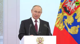 Putin participates in event marking Heroes of Fatherland Day