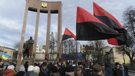 Demonstrators gather at the monument to Stepan Bandera in Lviv, Ukraine, on Januray 1, 2023.