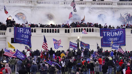 FILE PHOTO: Supporters of then-President Donald Trump are seen storming the US Capitol to protest the 2020 presidential election results, in Washington, DC, January 6, 2021.