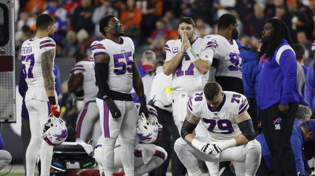 Buffalo Bills players react after teammate Damar Hamlin #3 was injured against the Cincinnati Bengals