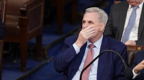 Republican Rep. Kevin McCarthy listens as the second round of votes are cast for the next speaker of the House, at the U.S. Capitol, in Washington, DC, January 3, 2023.