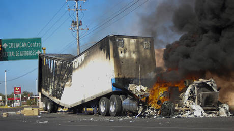 A truck burns on a street in Culiacan, Sinaloa state, January 5, 2023