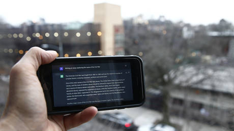 A ChatGPT prompt is shown on a device near a public school in Brooklyn, New York, January 5, 2023
