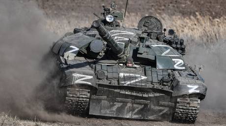 FILE PHOTO: A Russian T-72 tank on the move during Russia's militry operation in Ukraine.