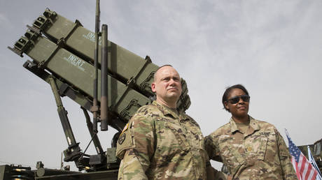 US army officers stand in front a US Patriot missile defence system on March 8, 2018.
