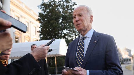 US President Joe Biden speaks to reporters in Washington, DC, January 11, 2022.