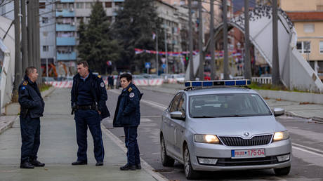 FILE PHOTO: Ethnic Albanian police patrol in North Mitrovica, Kosovo, December 28, 2022.