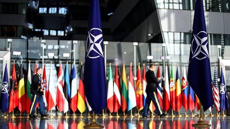 The national flags of North Atlantic Treaty Organization member states are seen at NATO headquarters on October 12, 2022 in Brussels, Belgium