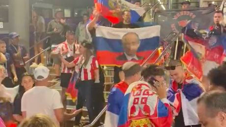 63d145c9203027146b5b67c5 Fans waving Russian flags detained at Australian Open