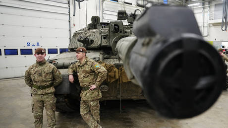 British military officers stand next to a Challenger 2 tank at the Tapa Military Camp in Estonia, January 19, 2023