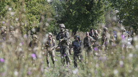 FILE PHOTO. Volunteers take part in training during courses with The Mozart Group, in the Donetsk region on September 22, 2022