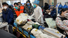 China reports record number of Covid-19 deaths