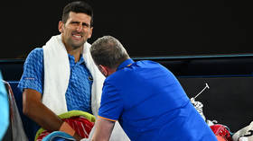 Djokovic overcomes injury concerns to progress in Australia