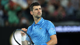 Djokovic destroys Australian rival in title quest