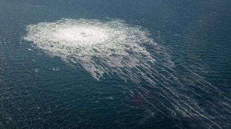 FILE PHOTO. Gas leaking from the Nord Stream 2 pipeline as seen from a Danish F-16 interceptor.