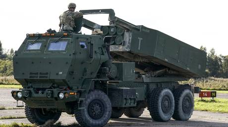 FILE PHOTO: High-Mobility Artillery Rocket System (HIMARS) is in operation during military exercises at Spilve Airport in Riga, Latvia, September 26, 2022