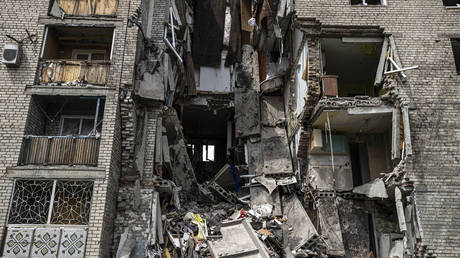 FILE PHOTO: Partially destroyed and damaged buildings are viewed after shelling in Bakhmut, Donetsk.