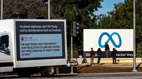 A mobile billboard is posted last month outside Meta's headquarters in Menlo Park, California, urging the company not to reinstate the Facebook and Instagram accounts of former President Donald Trump.