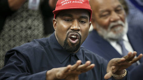 Rapper Kanye West speaks during a meeting with U.S. President Donald Trump in the Oval office of the White House on October 11, 2018