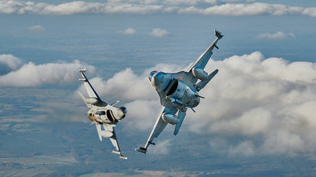 F-16 fighter jets takes part in the NATO Air Shielding exercise near the air base in Lask, central Poland on October 12, 2022.