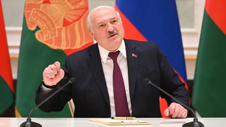 Belarusian President Alexander Lukashenko attends a joint news conference with his Russian counterpart Vladimir Putin following their talks at the Palace of Independence in Minsk, Belarus.