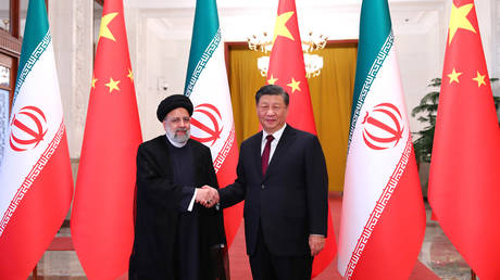 Iranian President Ebrahim Raisi (L) being welcomed by Chinese President Xi Jinping (R) with an official ceremony in Beijing, China on February 14, 2023.