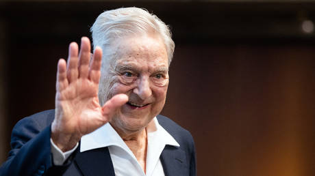 FILE PHOTO:  Investor and philanthropist George Soros talks to the audience after receiving the Schumpeter Award.