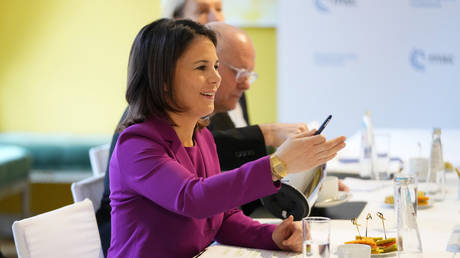 Annalena Baerbock gestures during a meeting with American, British and French ministers at the Munich Security Conference in Munich, Germany, February 18, 2023