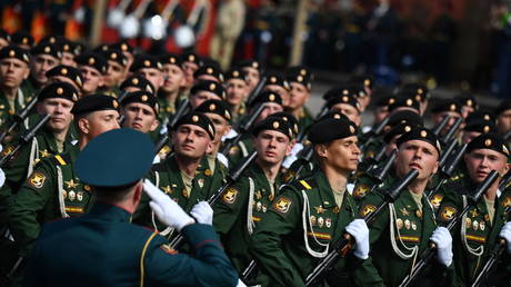 Servicemen take part in a dress rehearsal of a military parade marking the 77th anniversary of the victory over Nazi Germany in World War II, in Moscow, Russia.