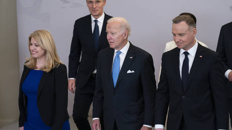 US President Joe Biden (center) after meetings with NATO leaders in Warsaw, Poland, February 22, 2023.