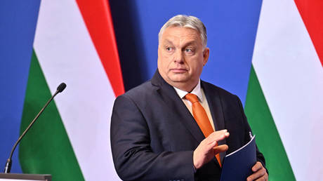 Hungarian Prime Minister Viktor Orban arrives to address an annual press conference in Budapest on December 21, 2022.