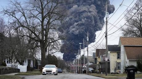A black plume rises after the controlled burning of derailed chemical tankers in East Palestine, Ohio, February 6, 2023