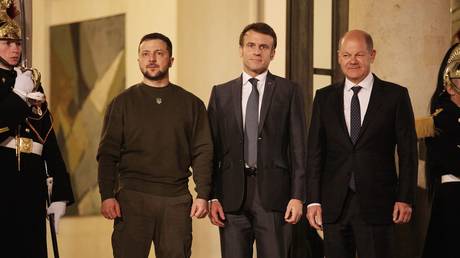 Left to right: Ukrainian President Vladimir Zelensky, French President Emmanuel Macron and German Chancellor Olaf Scholz at the Elysee Palace, February 9, 2023.
