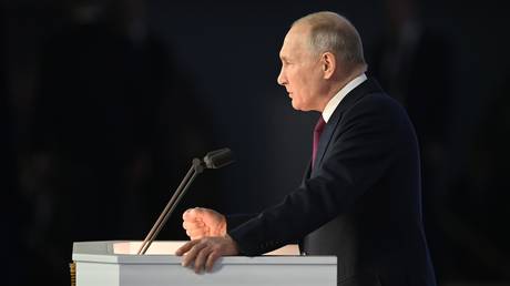 Russian President Vladimir Putin delivers his annual address to the Federal Assembly, including lawmakers of the State Duma, members of the Federation Council, regional governors and other officials, in Moscow, Russia.