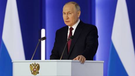 Russian President Vladimir Putin delivers his annual address to the Federal Assembly, including lawmakers of the State Duma, members of the Federation Council, regional governors and other officials, in Moscow, Russia.