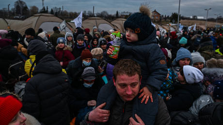 File photo: Families crossing from Ukraine into Poland at Medyka, March 08, 2022.