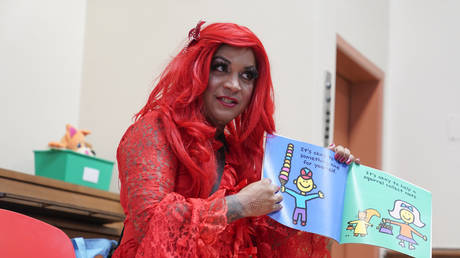 FILE PHOTO: A drag queen reads stories to children at a public library in New York, June 17, 2022