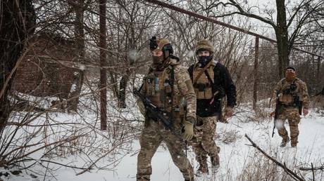 Servicemen of the Ukrainian Armed Forces patrol along the frontline near Bakhmut/Artyomovsk, February 18, 2023