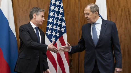 Antony Blinken, left, greets Sergey Lavrov before a meeting in Geneva, Switzerland, January 21, 2022