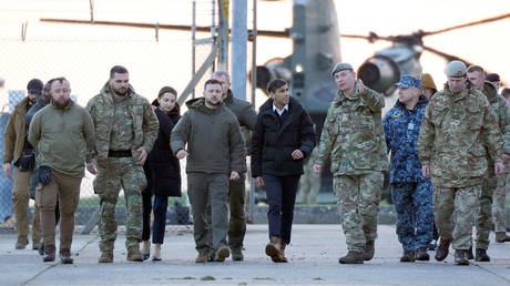 File photo: British Prime Minister Rishi Sunak and Ukrainian President Vladimir Zelensky meet Ukrainian troops being trained on Challenger 2 tanks at Lulworth in Dorset, southern England, February 8, 2023.