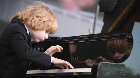 FILE PHOTO: A young Russian pianist, Elisey Mysin