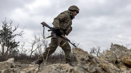 FILE PHOTO: A Ukrainian infantryman outside Artyomovsk (Bakhmut).