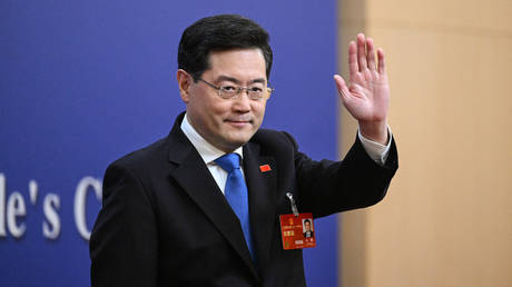 China's Foreign Minister Qin Gang arrives for a press conference in Beijing.