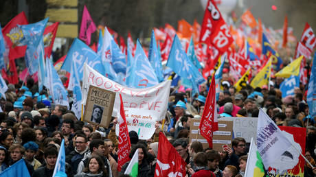 Protesters participate in a demonstration in Reims, northeastern France, against French President's pension reform, on March 7, 2023