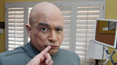 Actor John Di Domenico poses after changing into the Dr. Evil character from the "Austin Powers" film series.