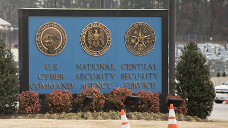 FILE PHOTO: A sign for the National Security Agency (NSA), US Cyber Command and Central Security Service, is seen near the visitor's entrance to the headquarters of the National Security Agency (NSA) at the entrance in Fort Meade, Maryland.