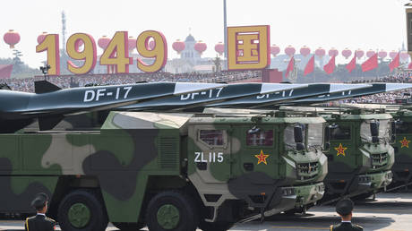 Military vehicles carrying DF-17 missiles participate in a military parade at Tiananmen Square in Beijing on October 1, 2019.