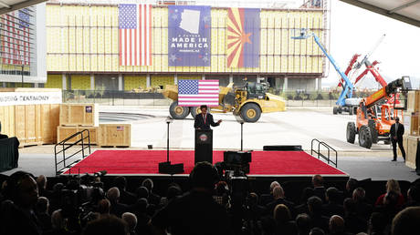 FILE PHOTO: Taiwan Semiconductor Manufacturing Company Chairman Mark Liu speaks in front of the new TSMC facility under construction in Phoenix, December 6, 2022